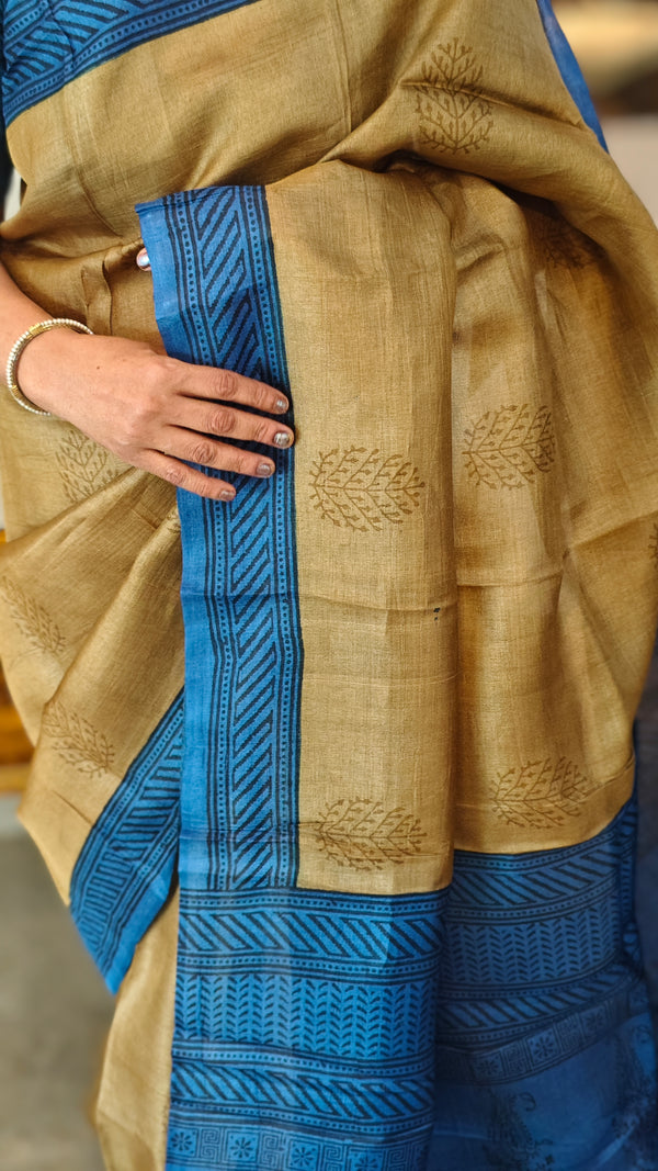 Golden brown printed tussar saree