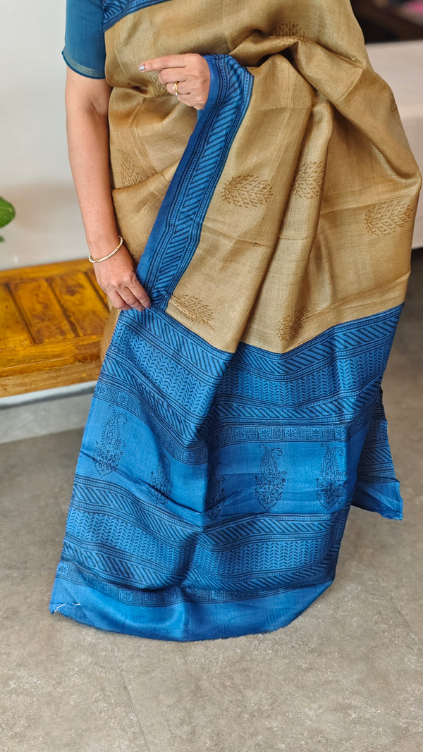 Golden brown printed tussar saree