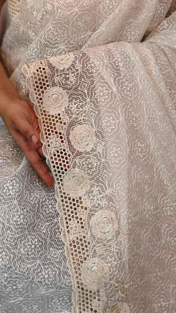 Cream shade cutwork saree