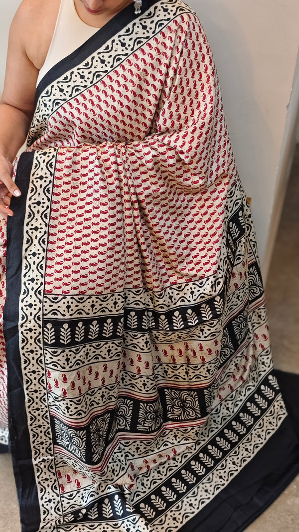 Red Semi crepe printed saree with black borders