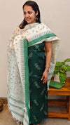 Green tussar silk suit off white dupatta
