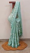 Mint green embroidered tussar silk saree
