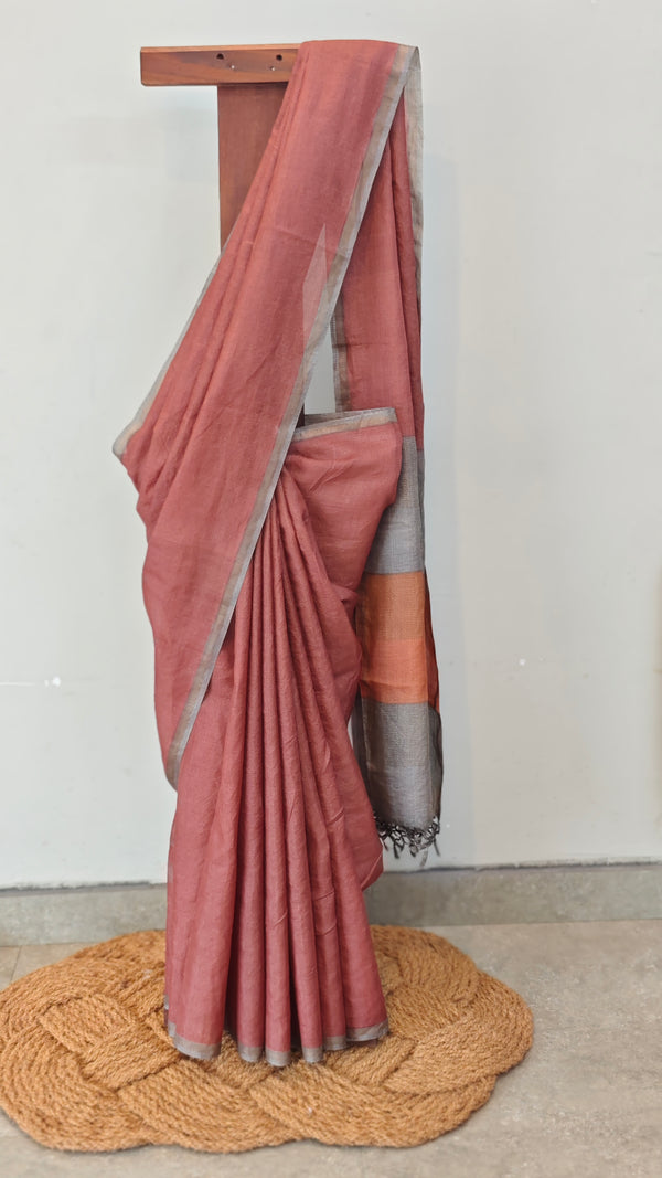 Brick red tussar silk saree with multi colour pallu