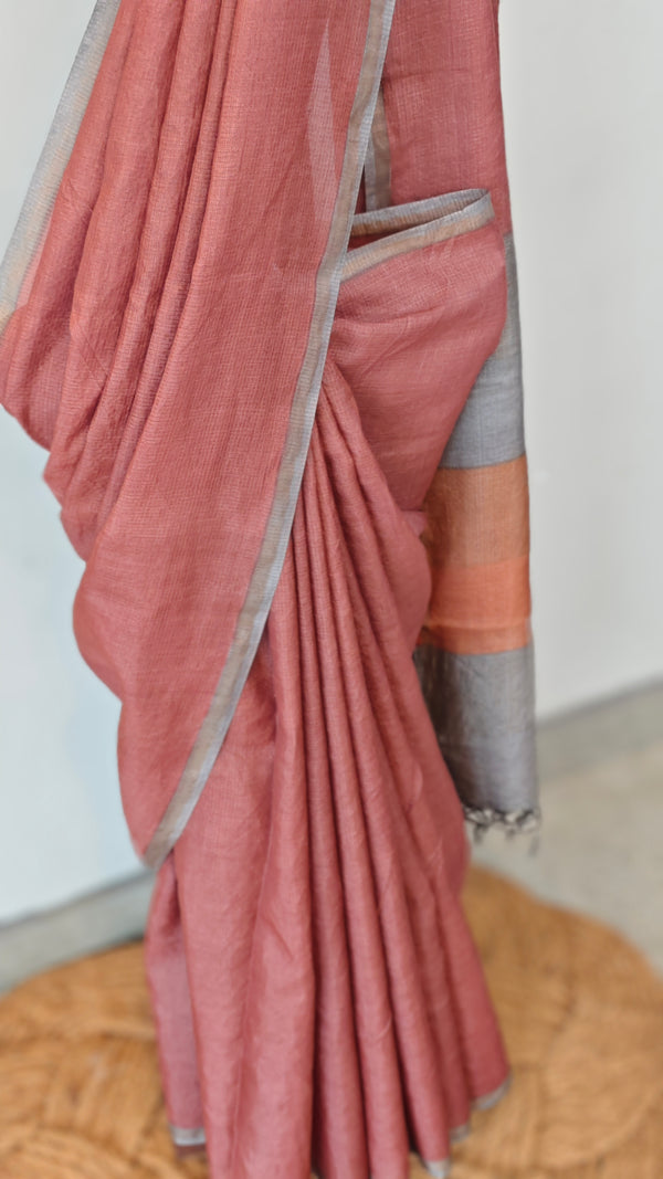 Brick red tussar silk saree with multi colour pallu
