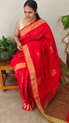 Reddish orange raw silk saree with elephant motifs
