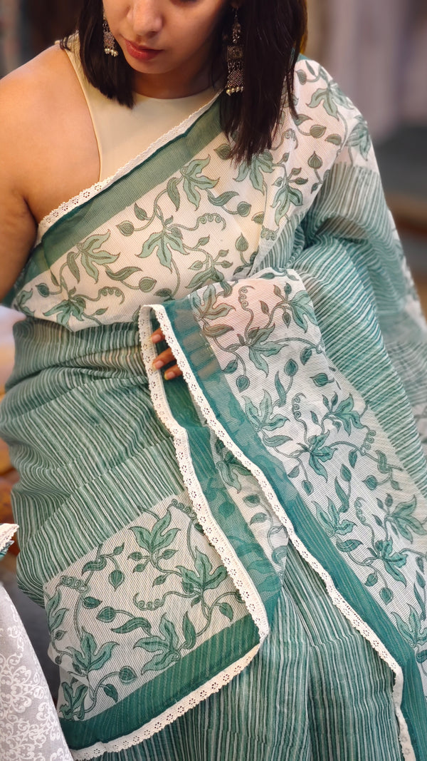 Teal and off white block printed net kota saree