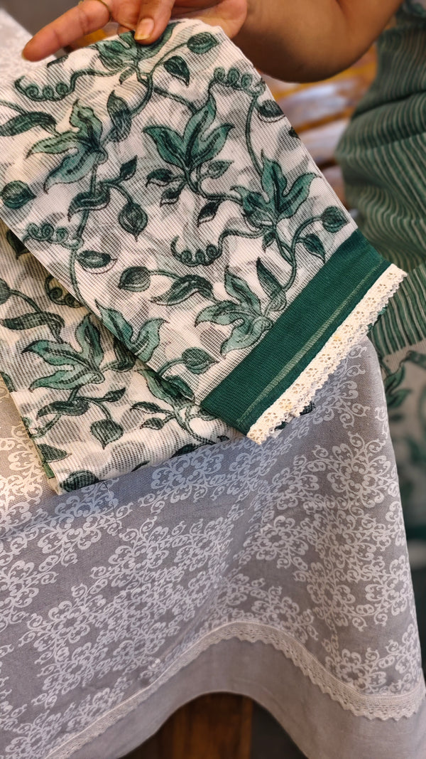 Teal and off white block printed net kota saree