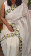 Milky white net kota saree with embroidery