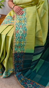 713HH - Light green and dark green raw silk saree with ikat borders