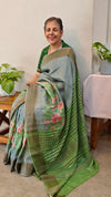 Bluish grey tussar floral printed tussar silk saree with cutwork pallu