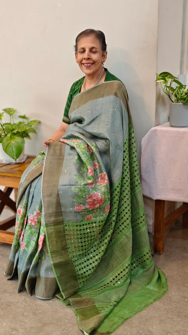 Bluish grey tussar floral printed tussar silk saree with cutwork pallu