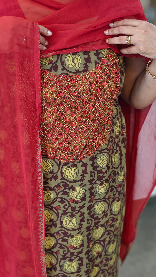 Vegetable print suit with bead work yoke