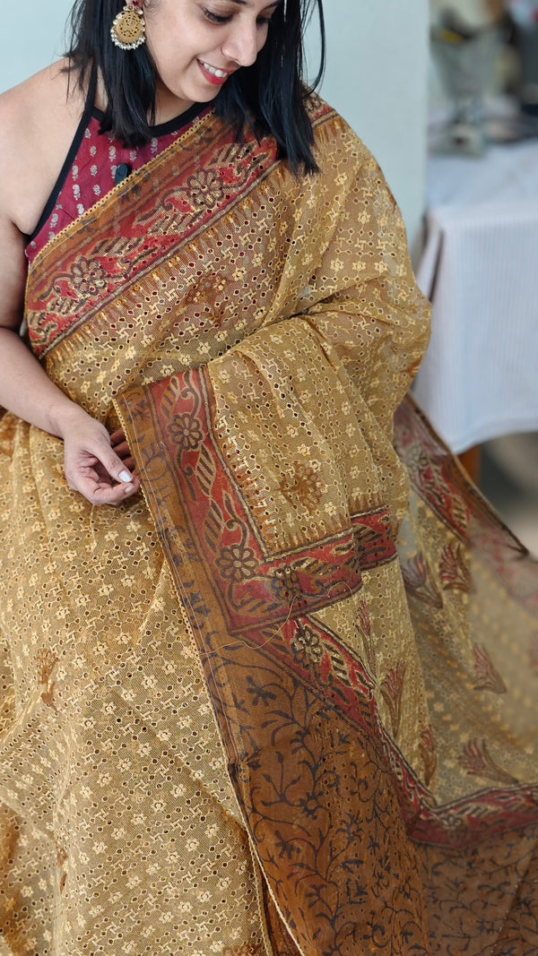 Hakoba kota brown and mustard saree