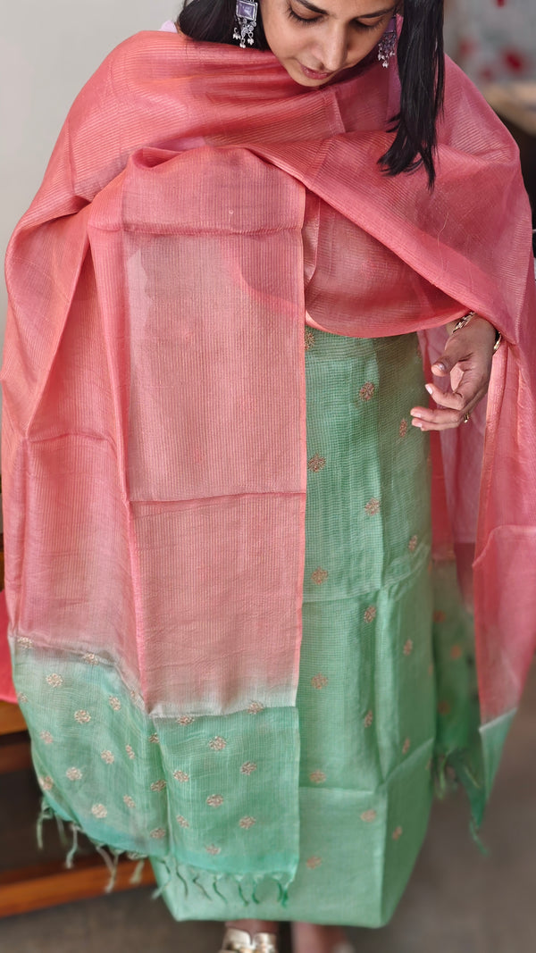 Green and peach zari embroidered tussar silk suit