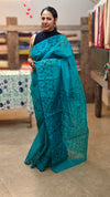 Bluish green block printed net kota saree