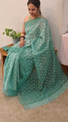 Teal green block printed organza saree