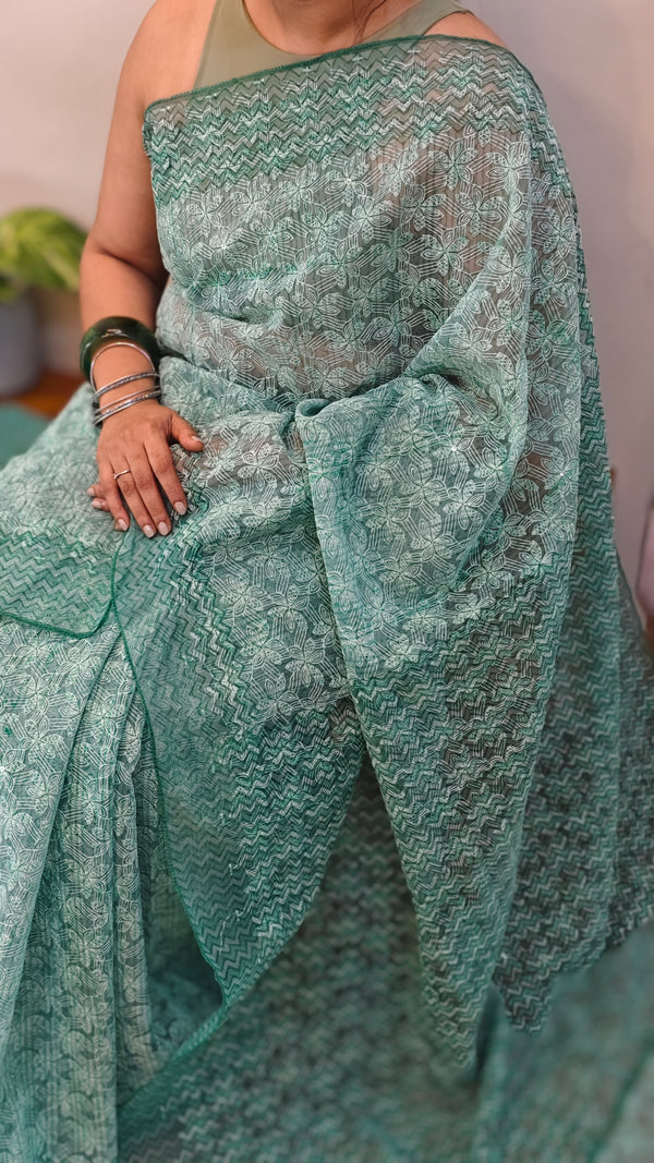 Teal green block printed organza saree