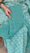 Teal green block printed organza saree