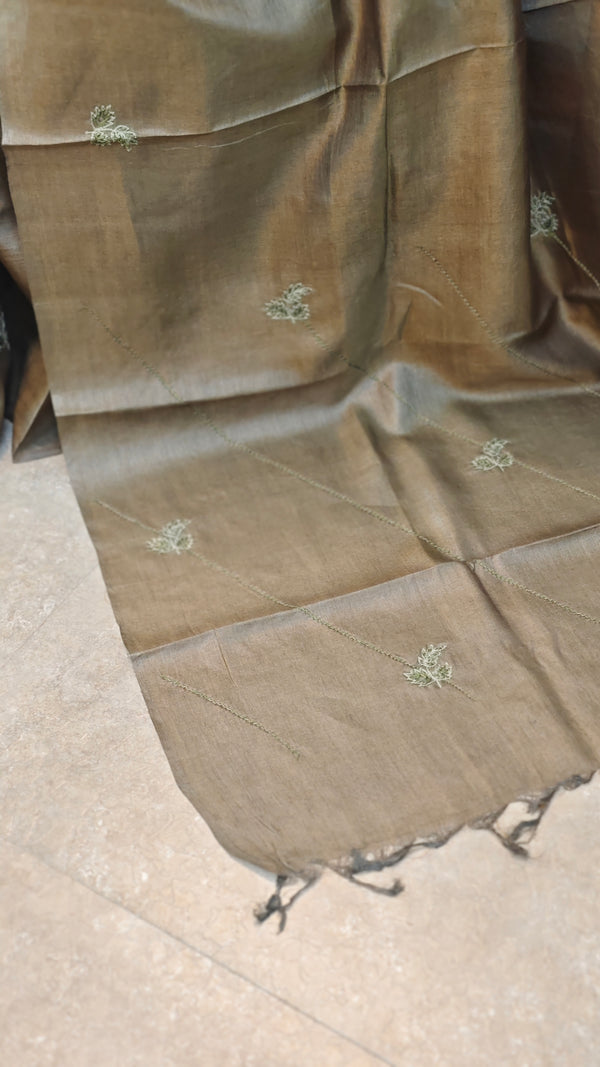 Metallic green tussar silk saree with hand embroidery