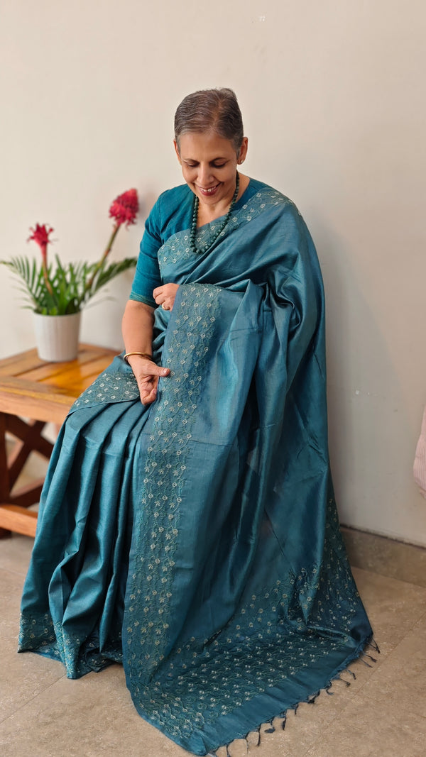 Turquoise embroidered tussar silk saree