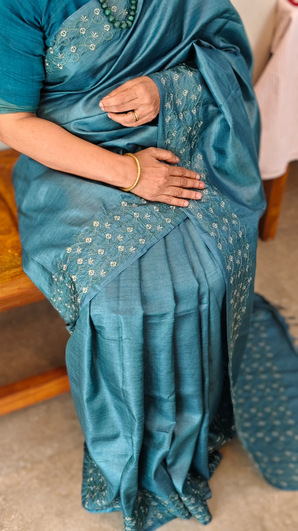 Turquoise embroidered tussar silk saree