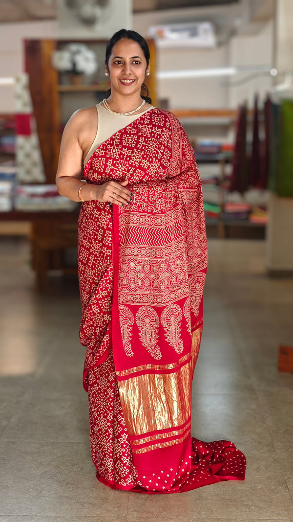 Red bandini print modal silk saree