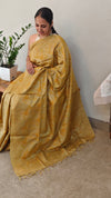 Yellowish green embroidered tussar silk saree with kantha work