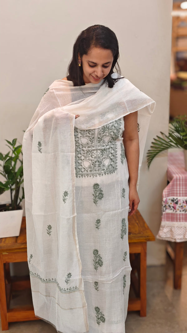 Sage green embroidery on off white mul chanderi suit
