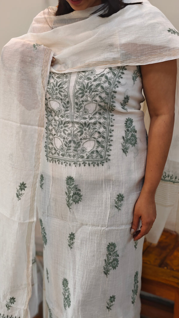 Sage green embroidery on off white mul chanderi suit