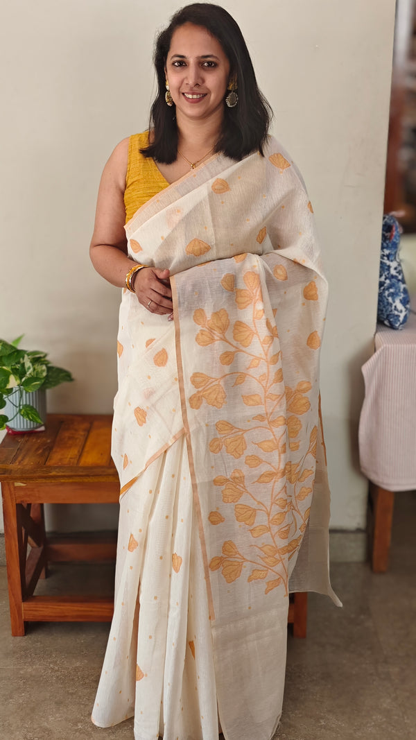 Off white and mustard jamdani saree