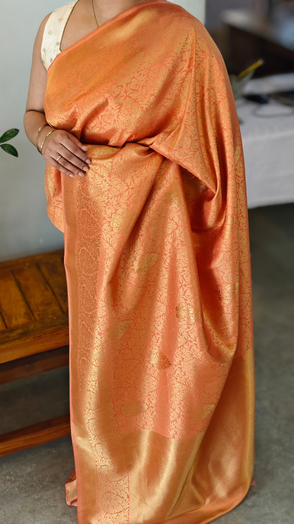 Sunset orange banarasi silk saree
