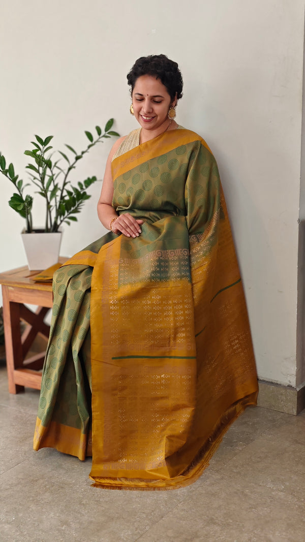 Moss green and mustard block printed kanchipuram saree
