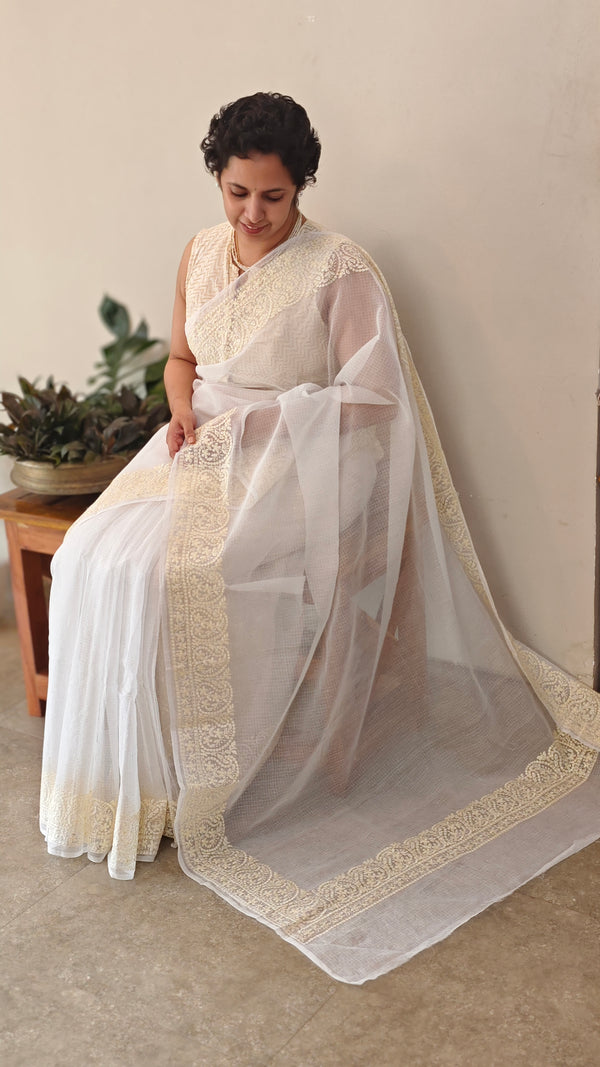 Off white and light yellow net kota saree