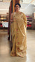 Beige semi tussar silk saree with hand embroidery