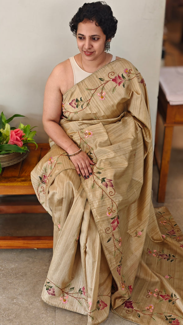 Beige semi tussar silk saree with hand embroidery