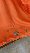 Orange muslin silk saree with hand embroidery