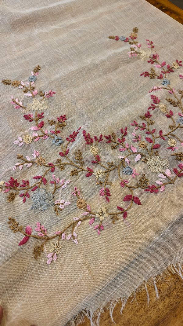 Cream linen tissue hand embroidered saree