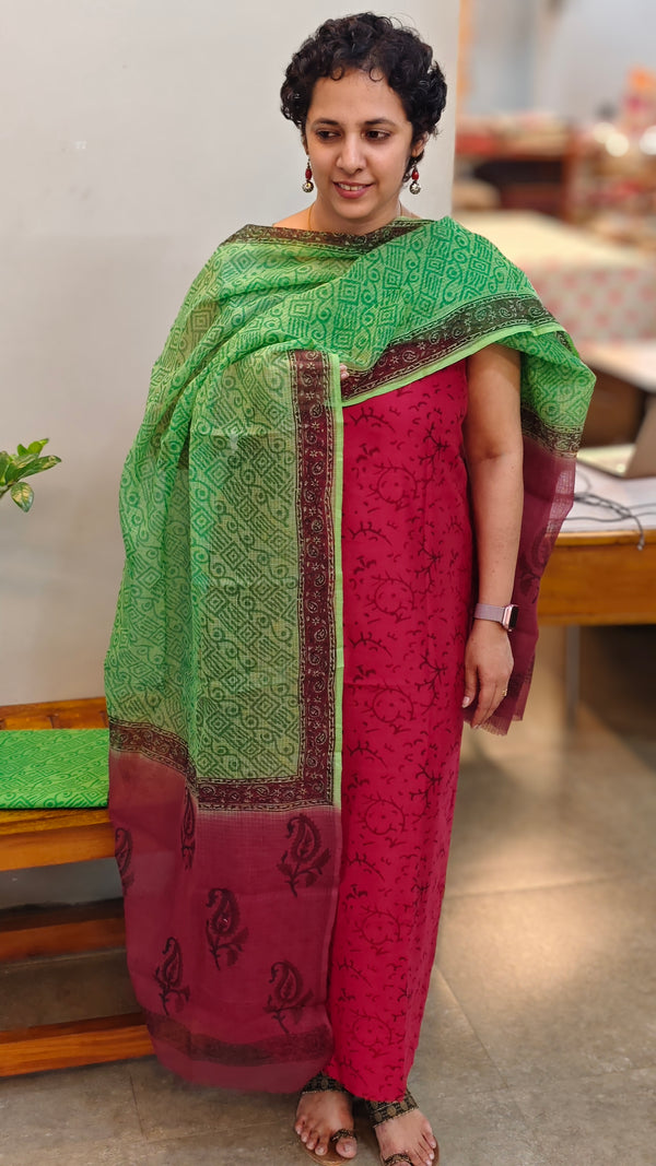 Maroon and green suit