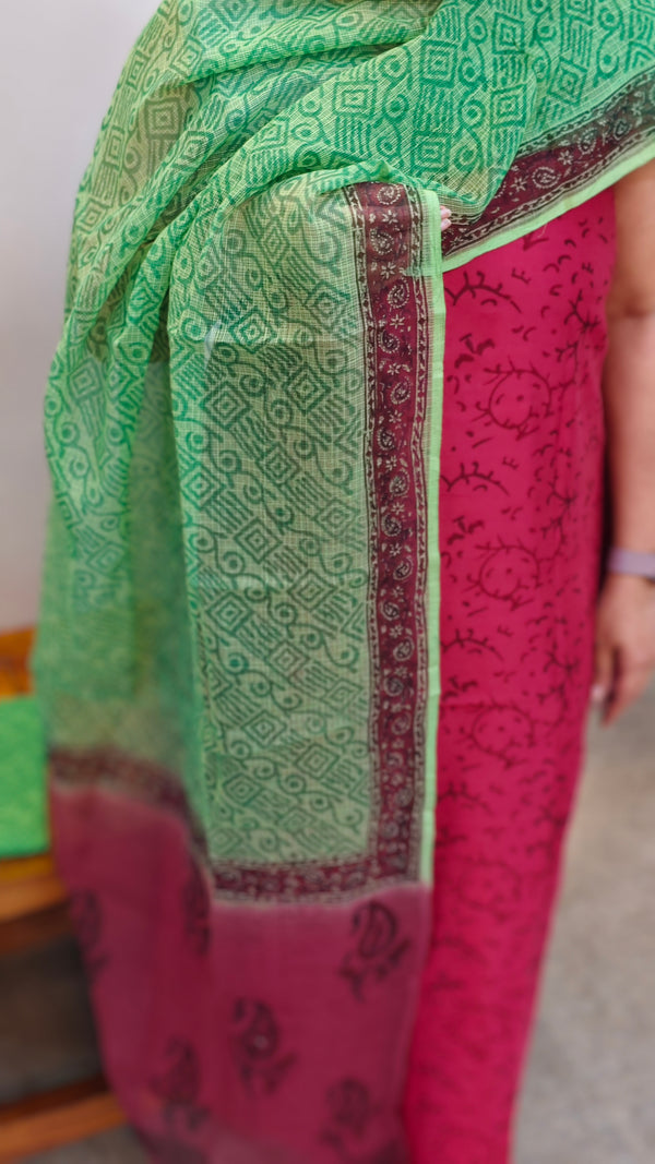 Maroon and green suit