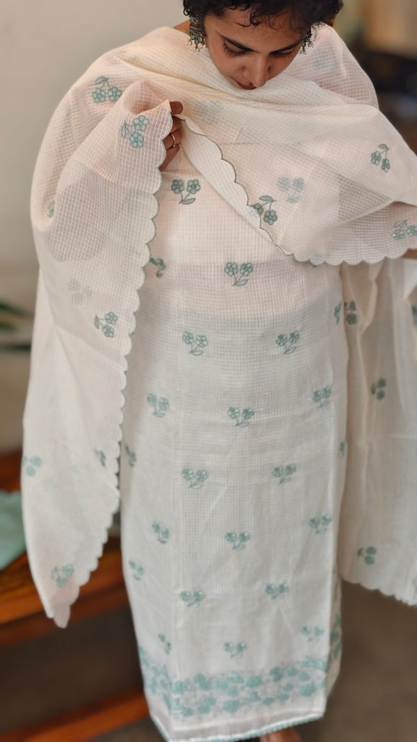 Off white and teal applique net kota suit