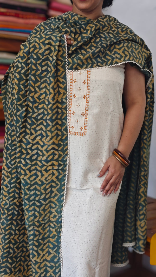 Off white cotton suit with Ajrakh Dupatta