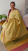 Pale yellow printed silky kota saree