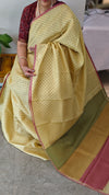 Pale yellow printed silky kota saree