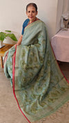 Aqua green linen tissue saree