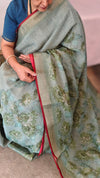 Aqua green linen tissue saree