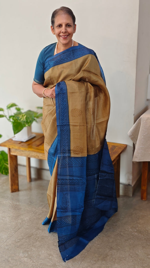 Golden brown printed tussar saree