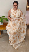 Off white linen tissue saree with brown applique