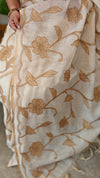 Off white linen tissue saree with brown applique