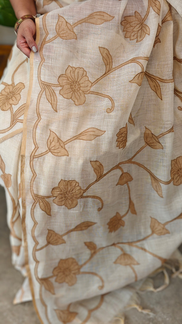 Off white linen tissue saree with brown applique