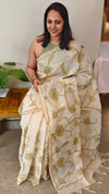 Off white linen tissue saree with green applique